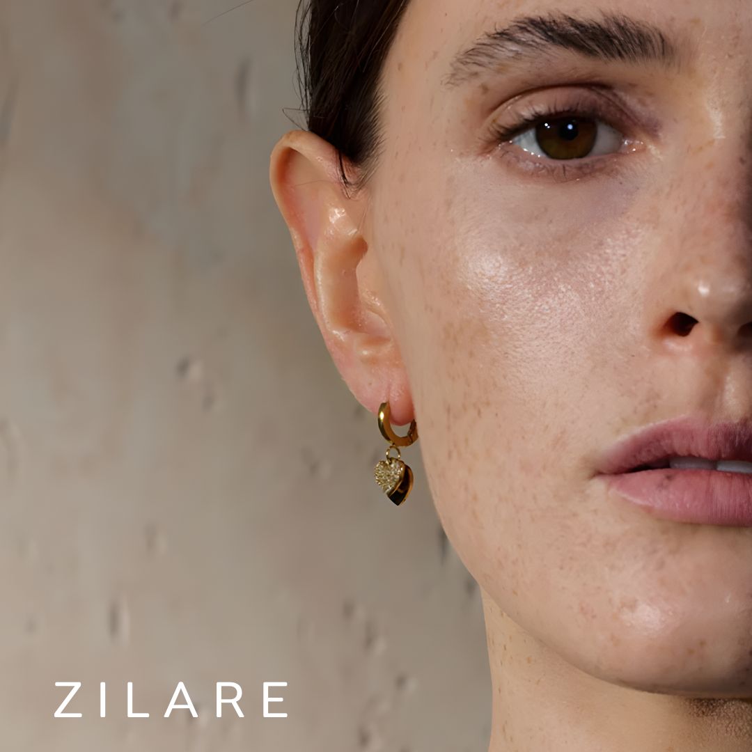 Aretes dorados elegantes con corazón bañados oro 18k Reina