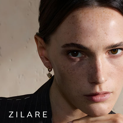 Aretes dorados elegantes con corazón bañados oro 18k Reina