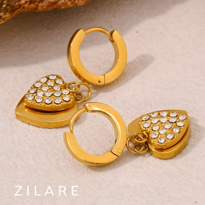 Aretes dorados elegantes con corazón bañados oro 18k Reina