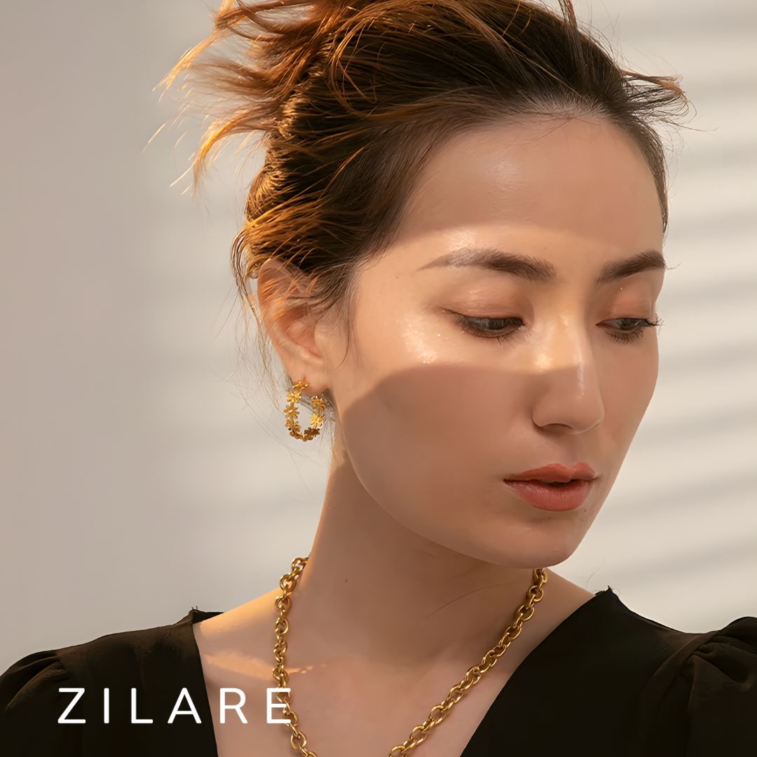 Aretes dorados de flores en aro bañados en oro 18k Bianca