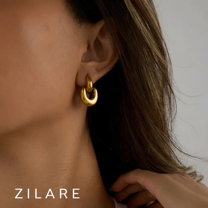 Aretes dorados sofisticado gruesos bañados en oro 18k Flavya