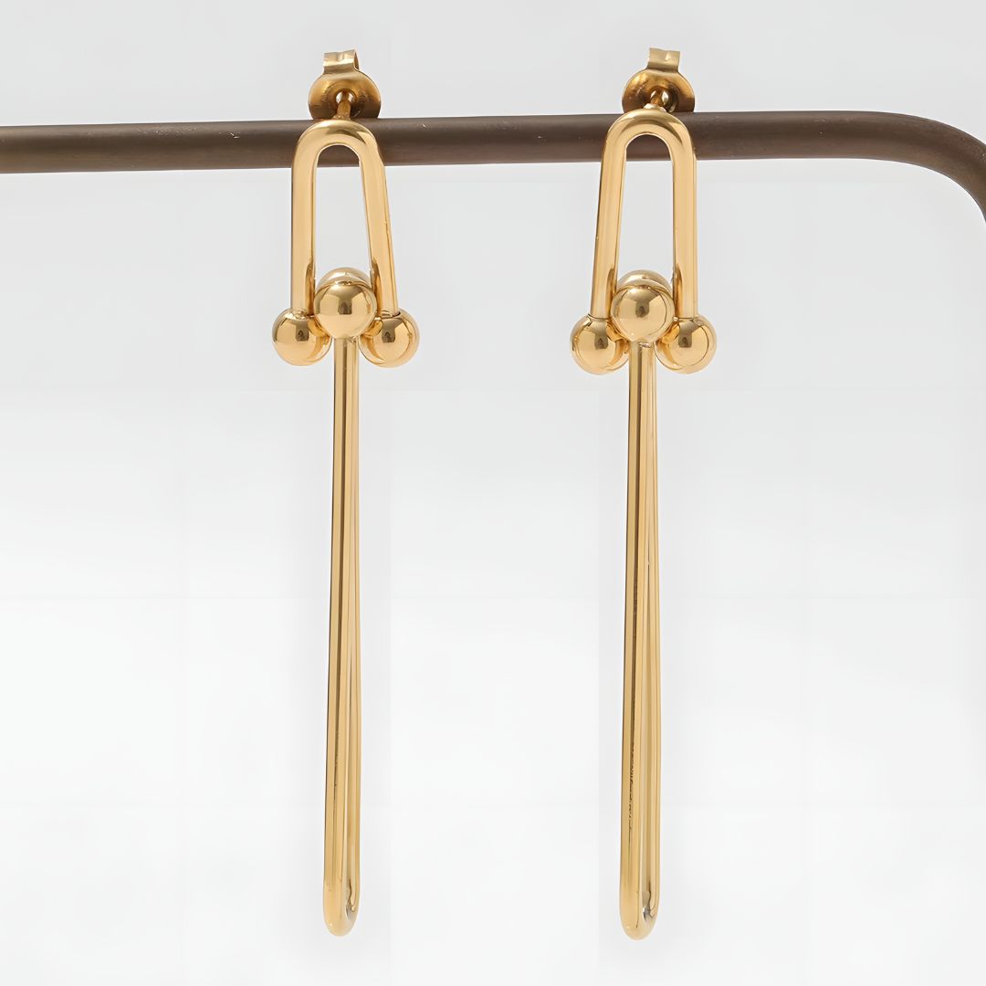 Aretes dorados largos elegantes bañados en oro 18k Adelina