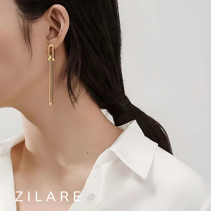 Aretes dorados largos elegantes bañados en oro 18k Adelina