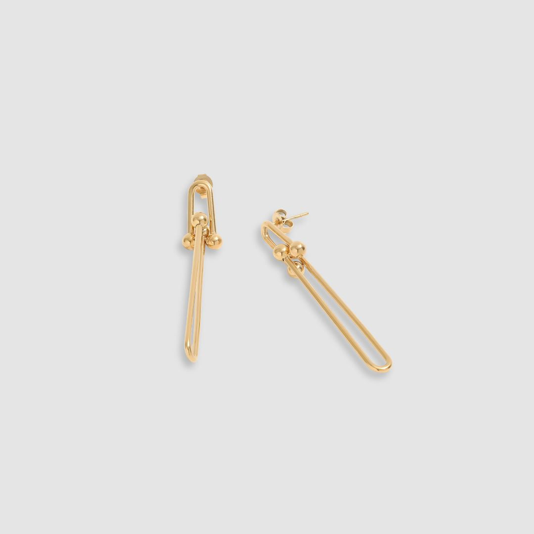 Aretes dorados largos elegantes bañados en oro 18k Adelina