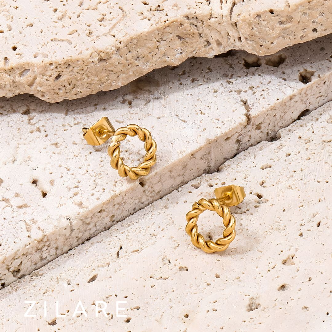 Aretes circulares dorados trenzados baño de oro 18k Mariela