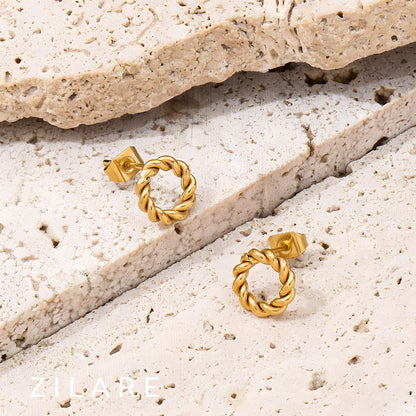 Aretes circulares dorados trenzados baño de oro 18k Mariela