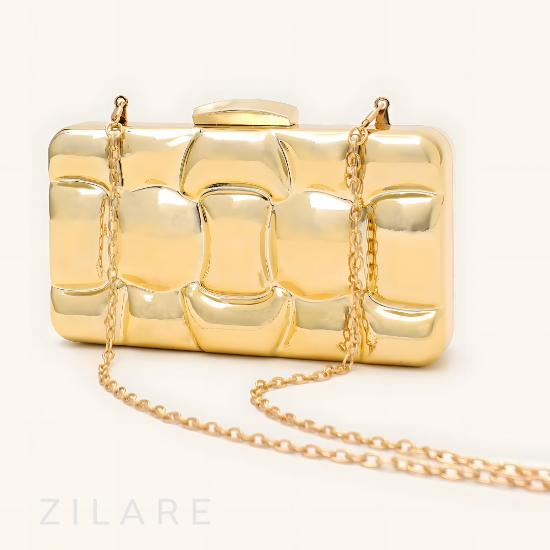 Bolsa de mano para mujer dorada con diseño texturizado Zyra