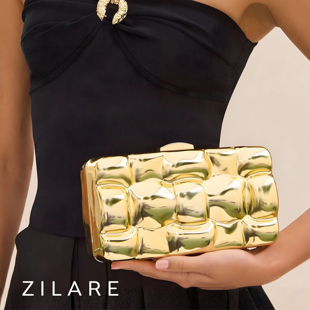 Bolsa de mano para mujer dorada con diseño texturizado Zyra