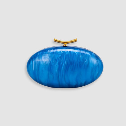 Bolsa de mano marfil nacarado con cierre dorado Marbella