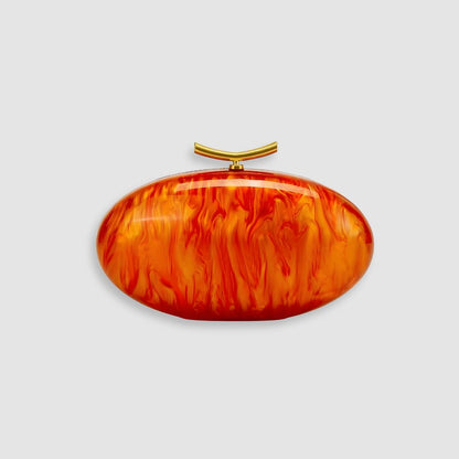 Bolsa de mano marfil nacarado con cierre dorado Marbella