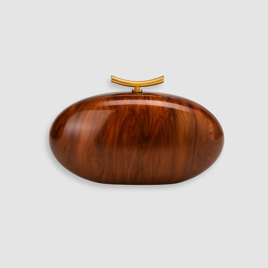 Bolsa de mano marfil nacarado con cierre dorado Marbella