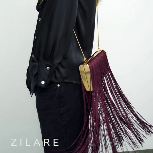 Bolsa de mano mujer vino con cadena y flecos largos Amaris