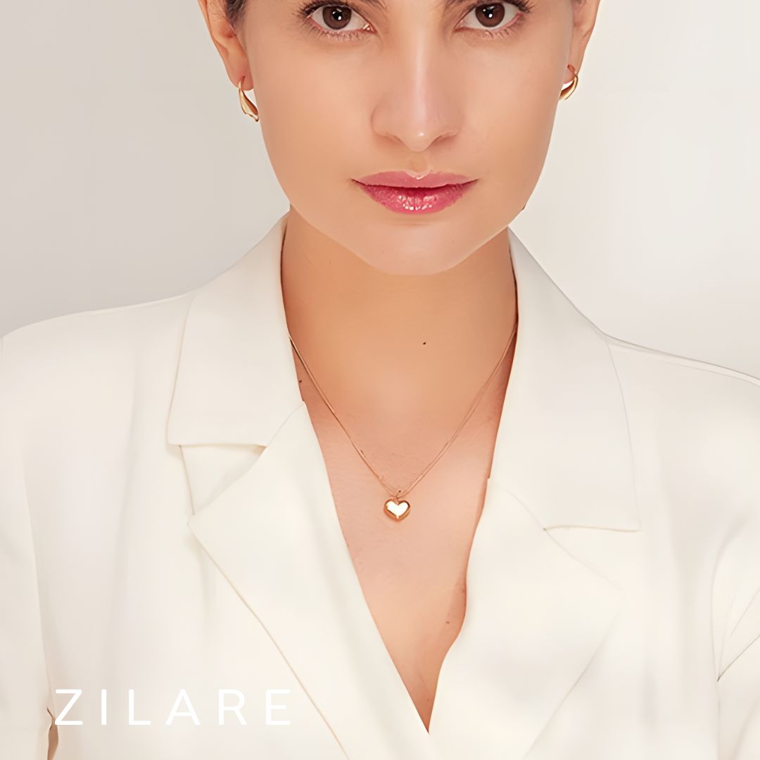 Collar bañado en oro 18k con dije de corazón blanco Zira