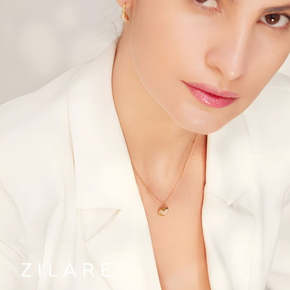 Collar bañado en oro 18k con dije de corazón blanco Zira