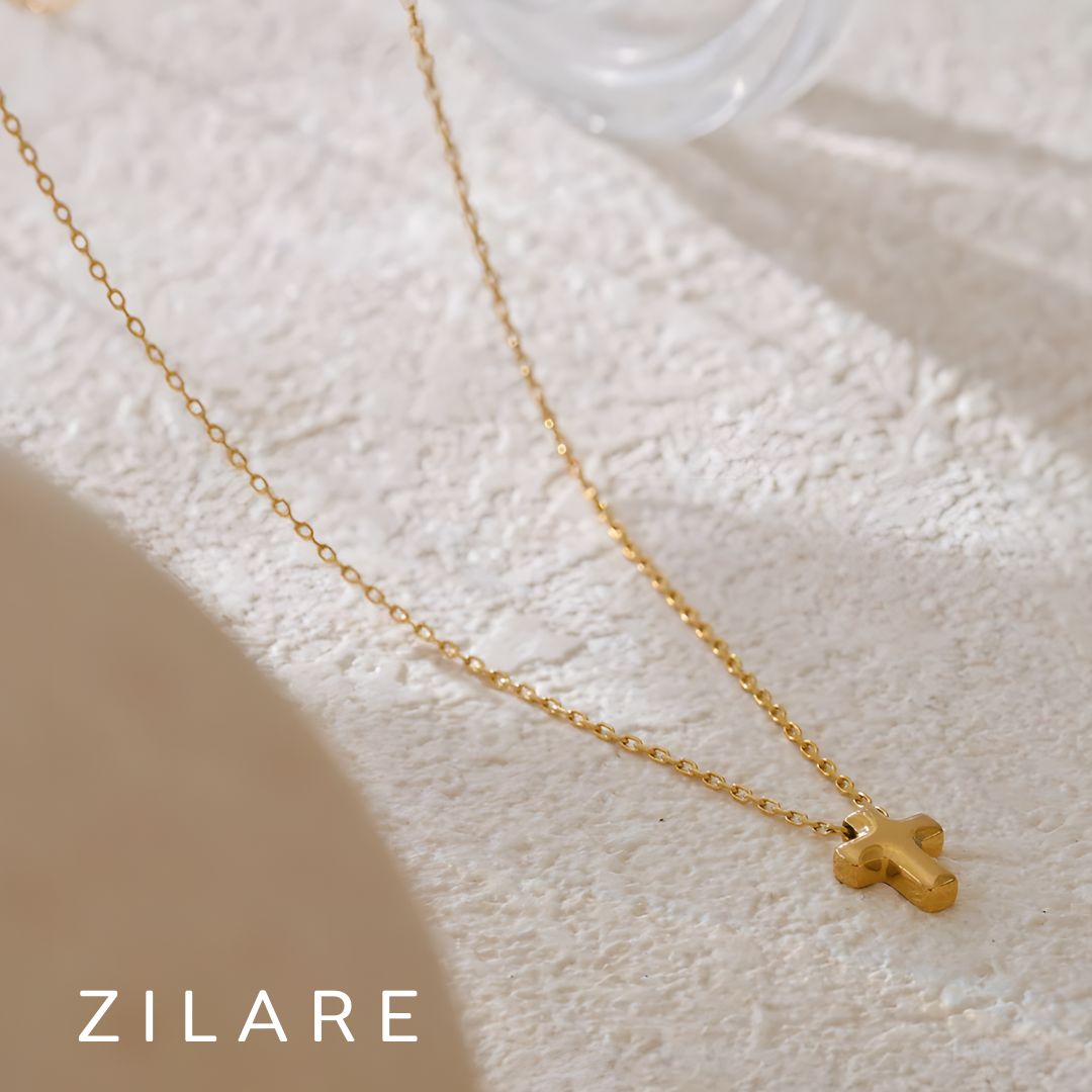 Collar dorado bañado en oro 18k con cruz elegante Selini