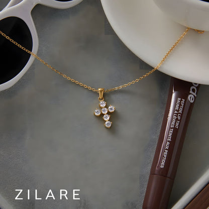 Collar delicado baño de oro 18k con cruz radiante Daila