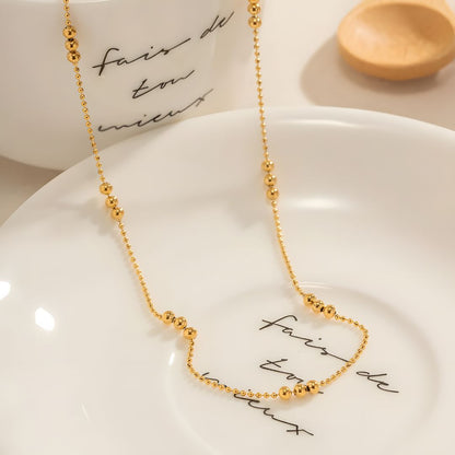 Collar dorado baño de oro 18k con esferas brillantes Amarie