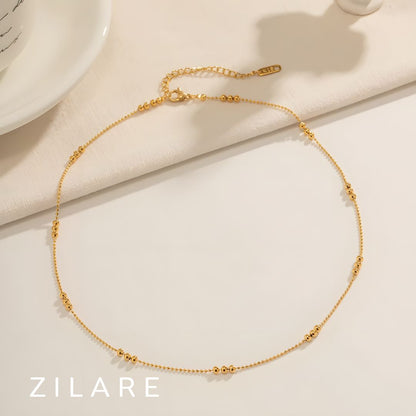 Collar dorado baño de oro 18k con esferas brillantes Amarie