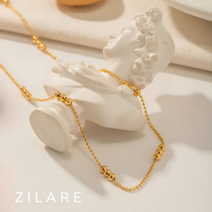 Collar dorado baño de oro 18k con esferas brillantes Amarie