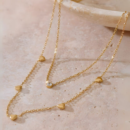 Collar doble con corazones y brillante bañado en oro 18k Isis