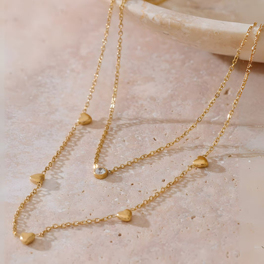 Collar doble con corazones y brillante bañado en oro 18k Isis