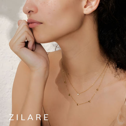 Collar doble con corazones y brillante bañado en oro 18k Isis