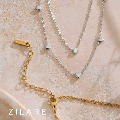 Collar doble con corazones y brillante bañado en oro 18k Isis