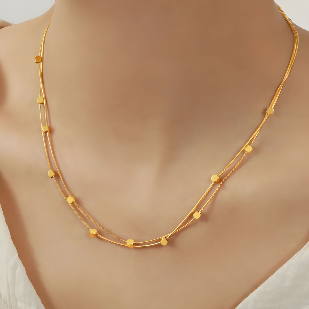 Collar dorado chic baño de oro 18k doble y moderno Adhara