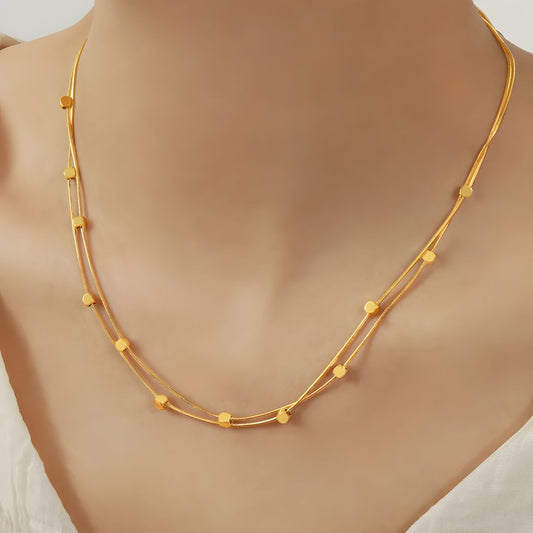 Collar dorado chic baño de oro 18k doble y moderno Adhara