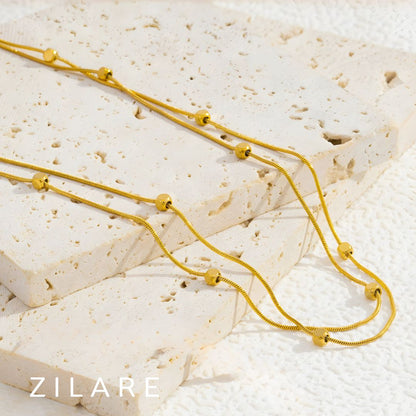 Collar dorado chic baño de oro 18k doble y moderno Adhara