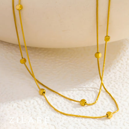 Collar dorado chic baño de oro 18k doble y moderno Adhara