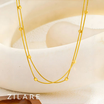 Collar dorado chic baño de oro 18k doble y moderno Adhara