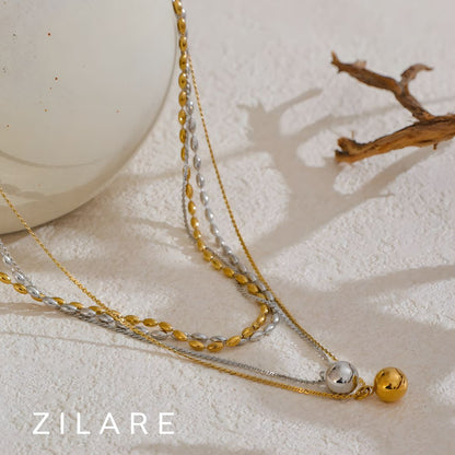 Collar doble bañado en oro 18k con esfera colgante Roxana