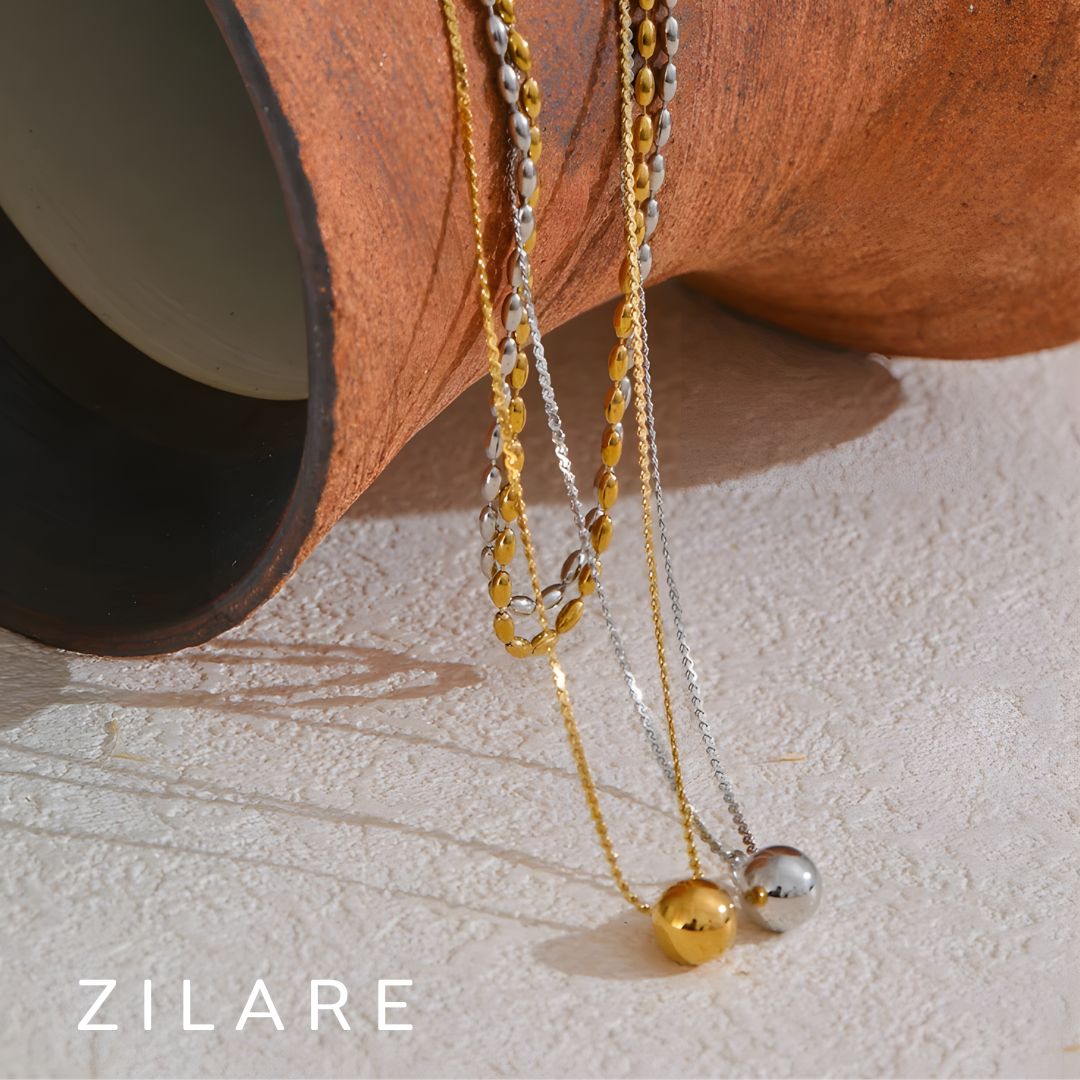 Collar doble bañado en oro 18k con esfera colgante Roxana