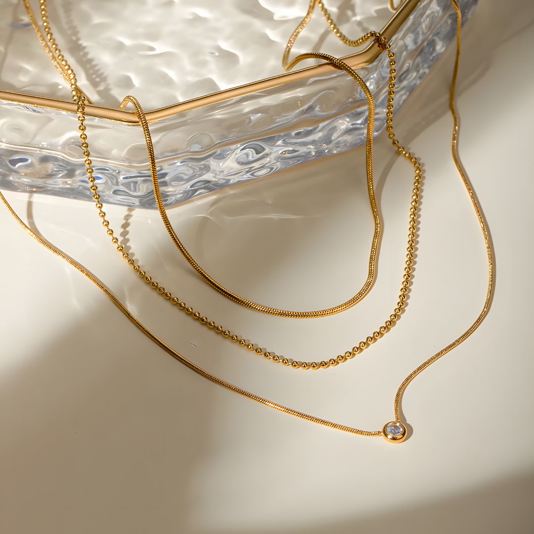 Collar delicado baño de oro 18k con tres cadenas Celina