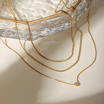 Collar delicado baño de oro 18k con tres cadenas Celina