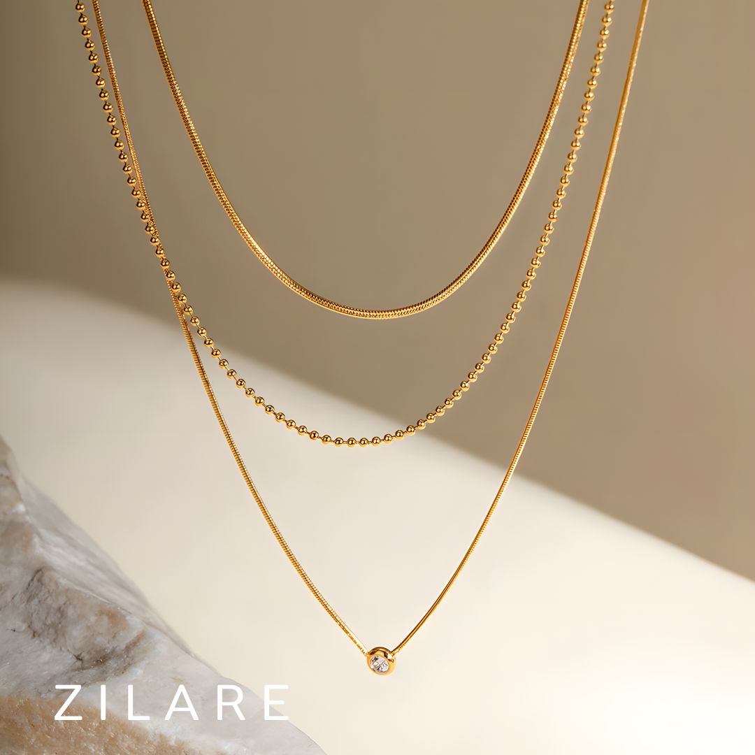 Collar delicado baño de oro 18k con tres cadenas Celina