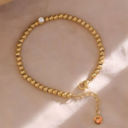 Pulsera bañada en oro 18k con cuentas y brillante Jimena