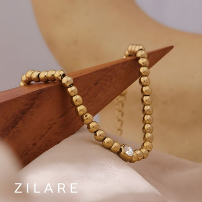 Pulsera bañada en oro 18k con cuentas y brillante Jimena