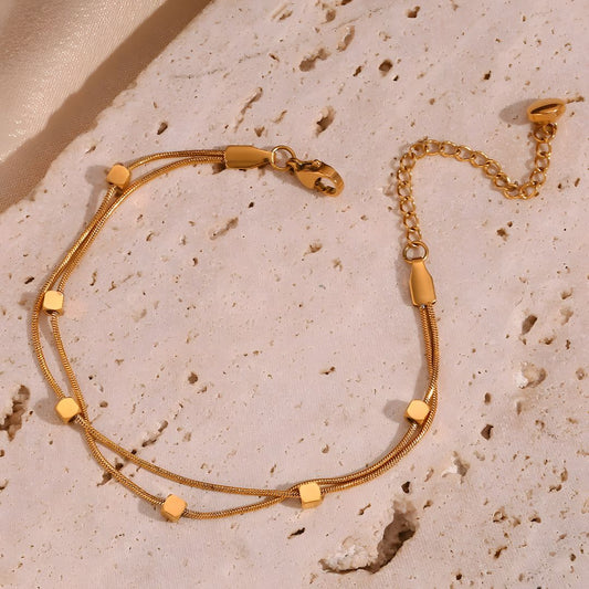 Pulsera dorada doble elegante con baño de oro 18k Leira