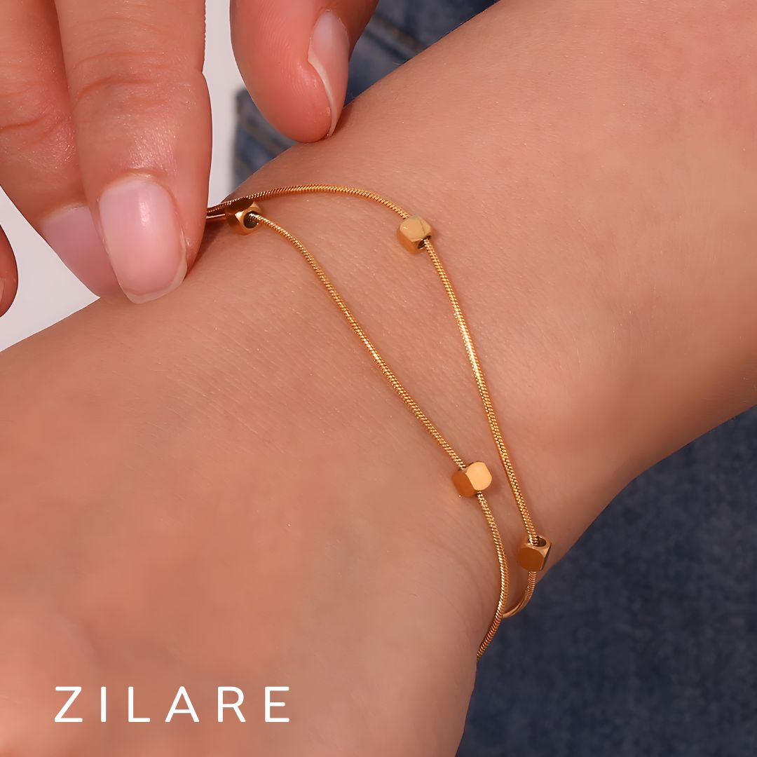 Pulsera dorada doble elegante con baño de oro 18k Leira