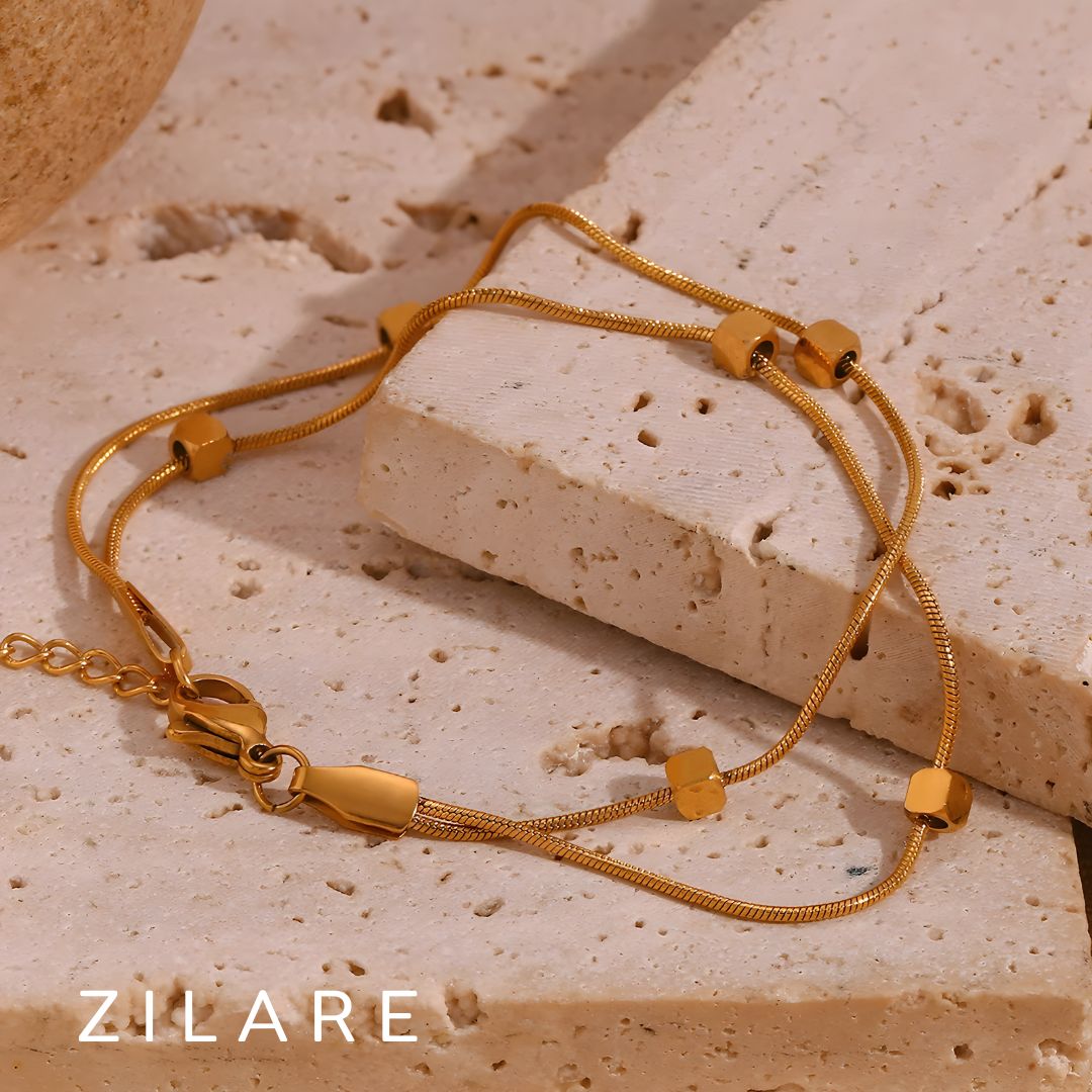 Pulsera dorada doble elegante con baño de oro 18k Leira