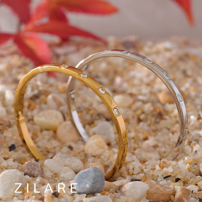 Pulsera dorada con brillos elegantes bañada en oro 18k Nilza
