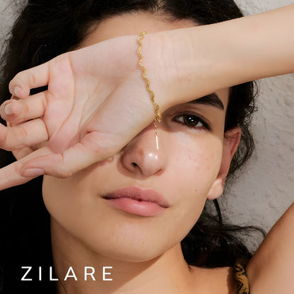 Pulsera ondulada dorada moderna bañada en oro 18k Abril