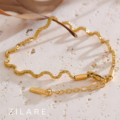 Pulsera ondulada dorada moderna bañada en oro 18k Abril
