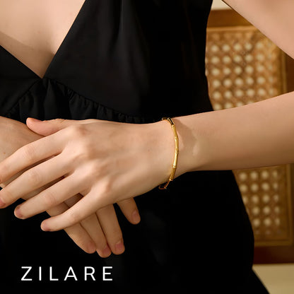 Pulsera dorada elegante tipo bambú bañada en oro 18k Samara