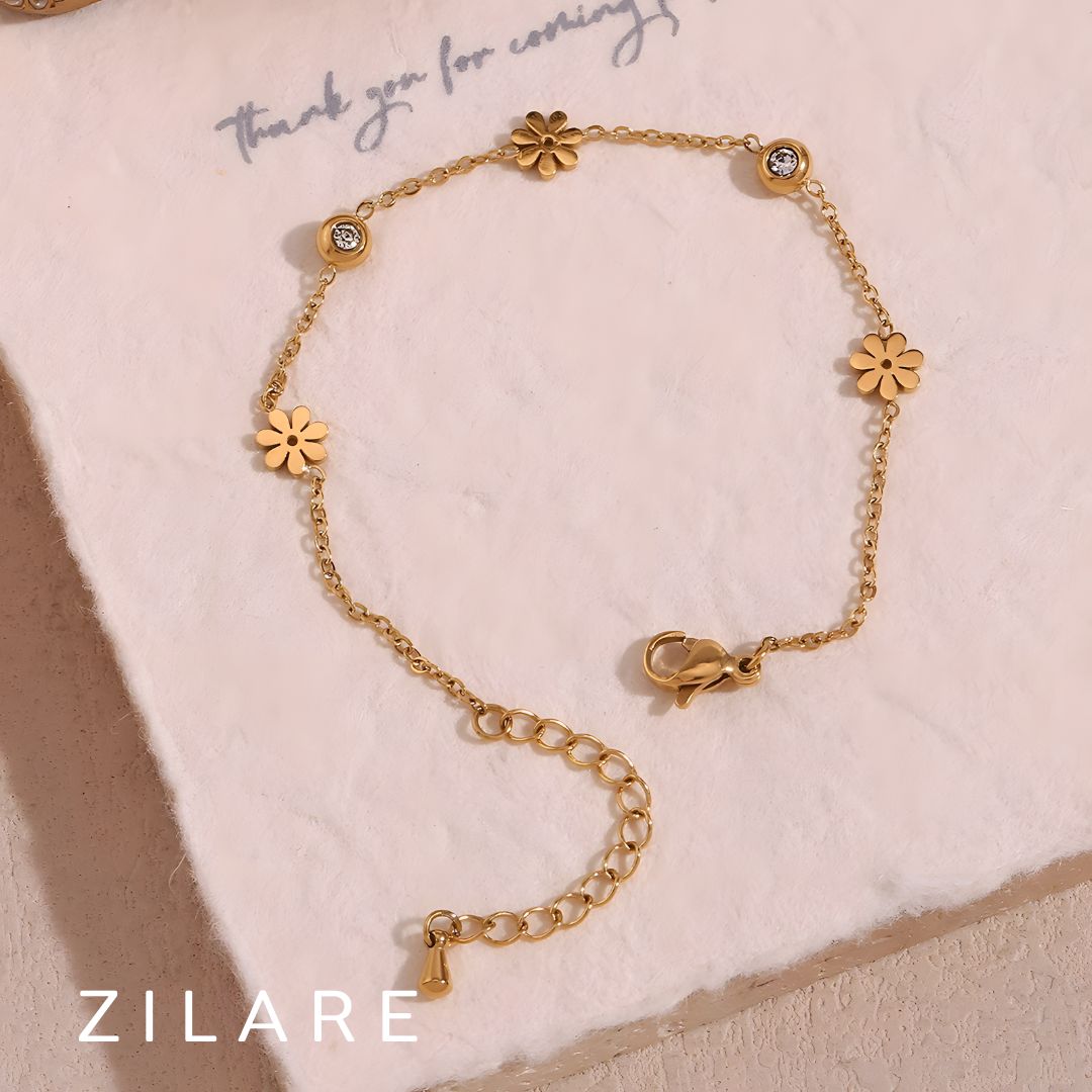 Pulsera de flores dorada delicada con baño de oro 18k Aranza
