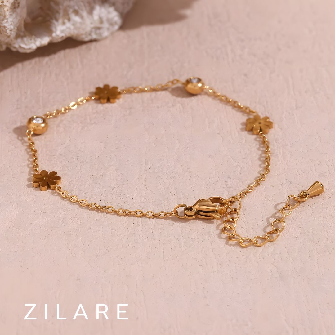 Pulsera de flores dorada delicada con baño de oro 18k Aranza