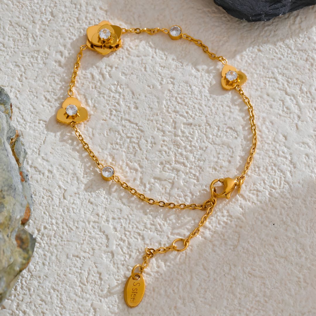 Pulsera dorada con flor y brillo bañado en oro 18k Eliana