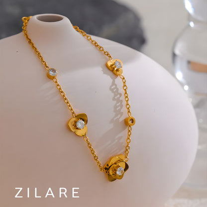 Pulsera dorada con flor y brillo bañado en oro 18k Eliana